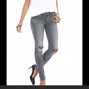 Distressed dark grey jeans